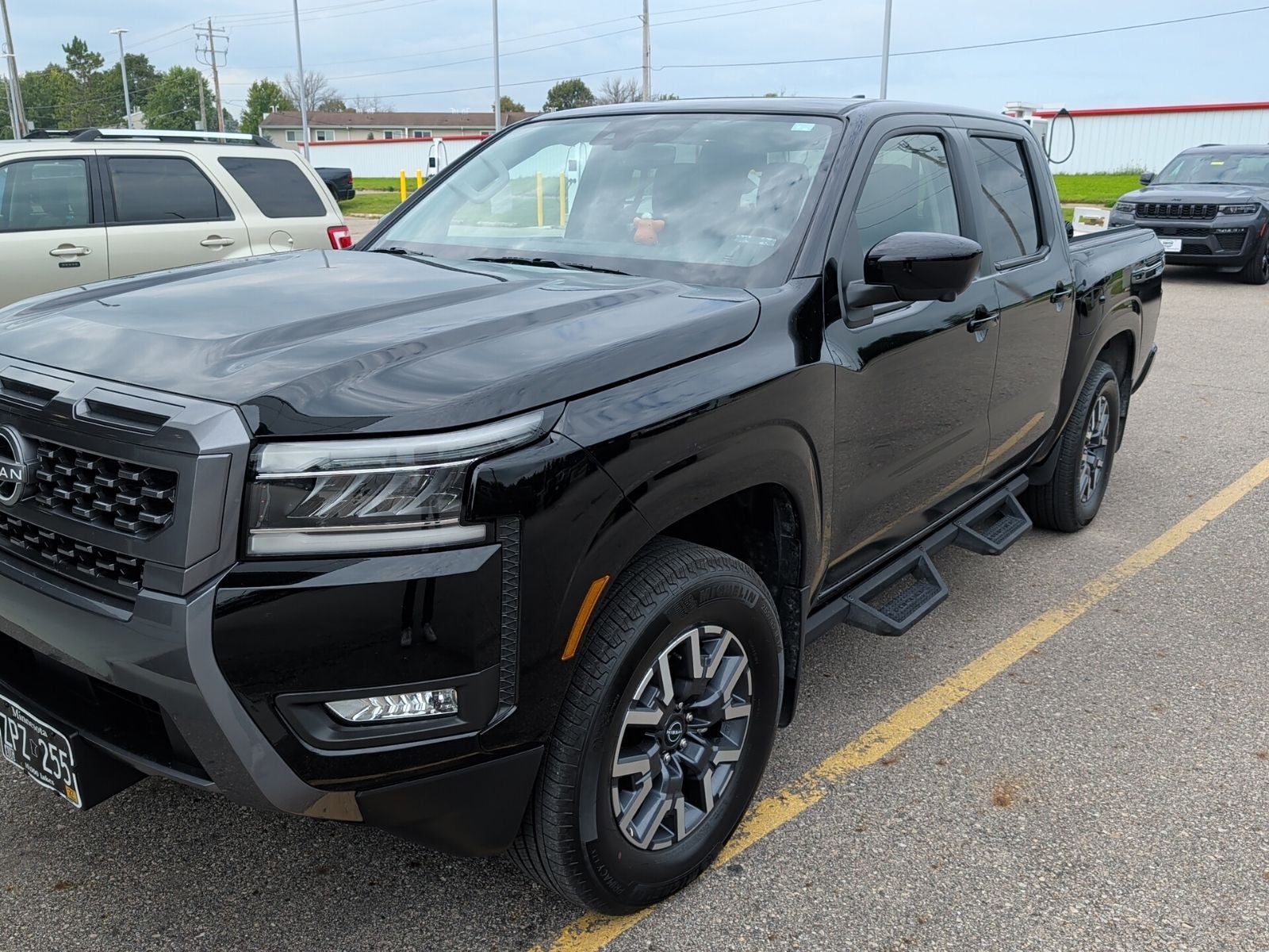 Used 2025 Nissan Frontier SL with VIN 1N6ED1EKXSN632050 for sale in Austin, Minnesota